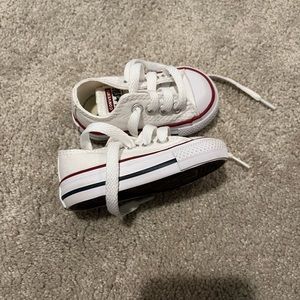 Baby white converse sneakers